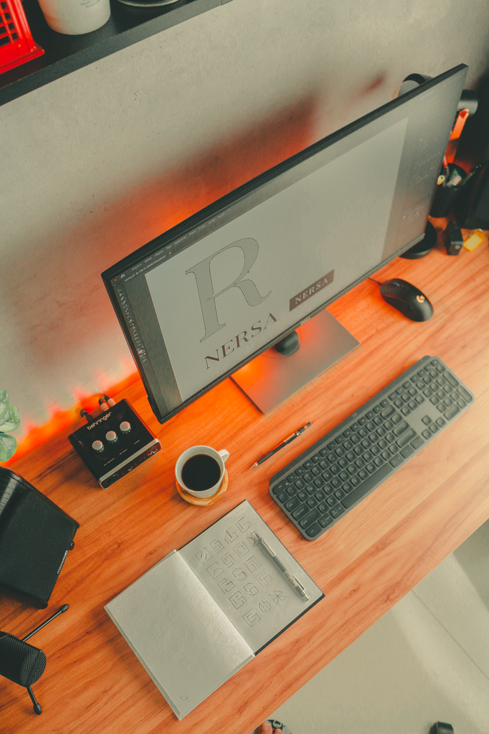 Crafting Captivating Headlines: Your awesome post title goes here Top view of a stylish home office desk with coffee, computer, and accessories.